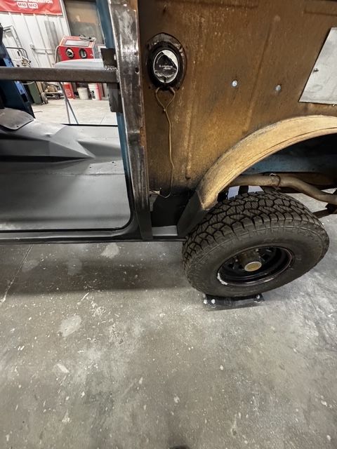 Wheel arch cut back to good metal