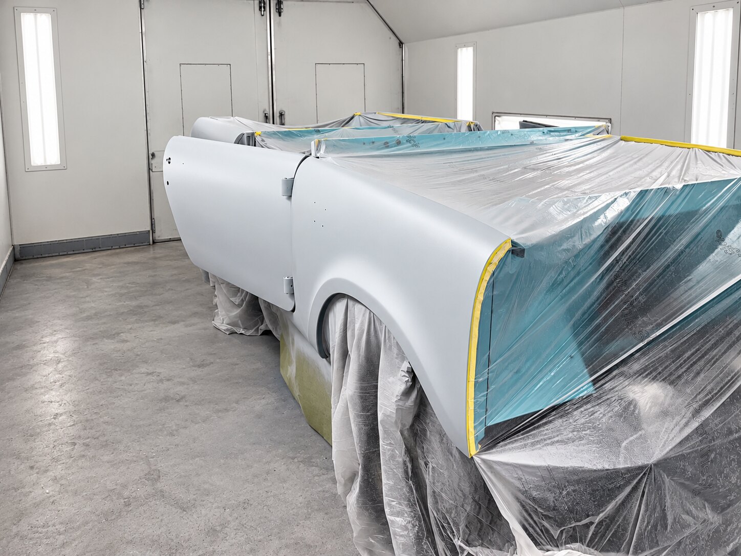 Side in primer, masked for paint